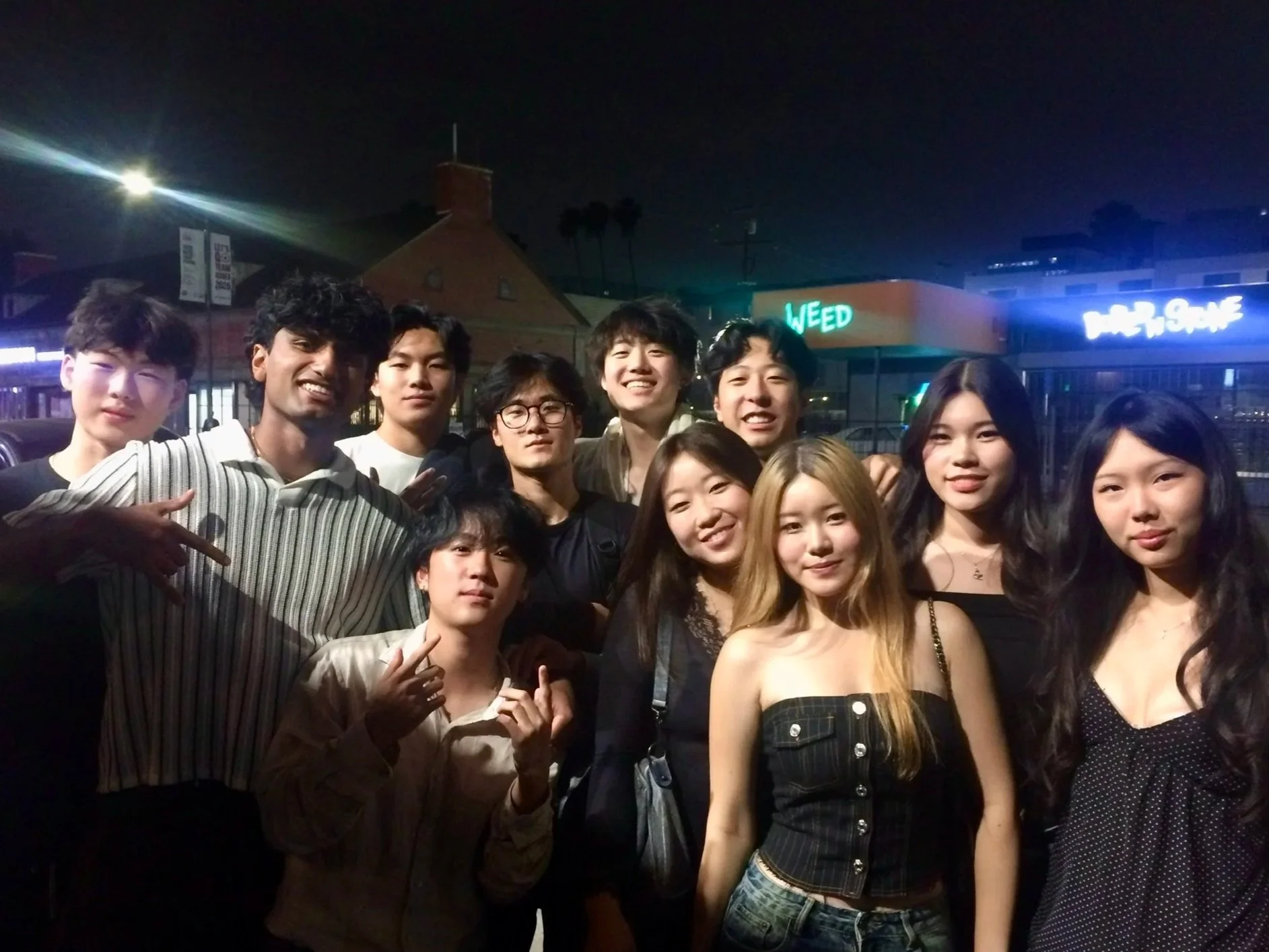 UCLA Delta Sigma Pi brothers together at night
